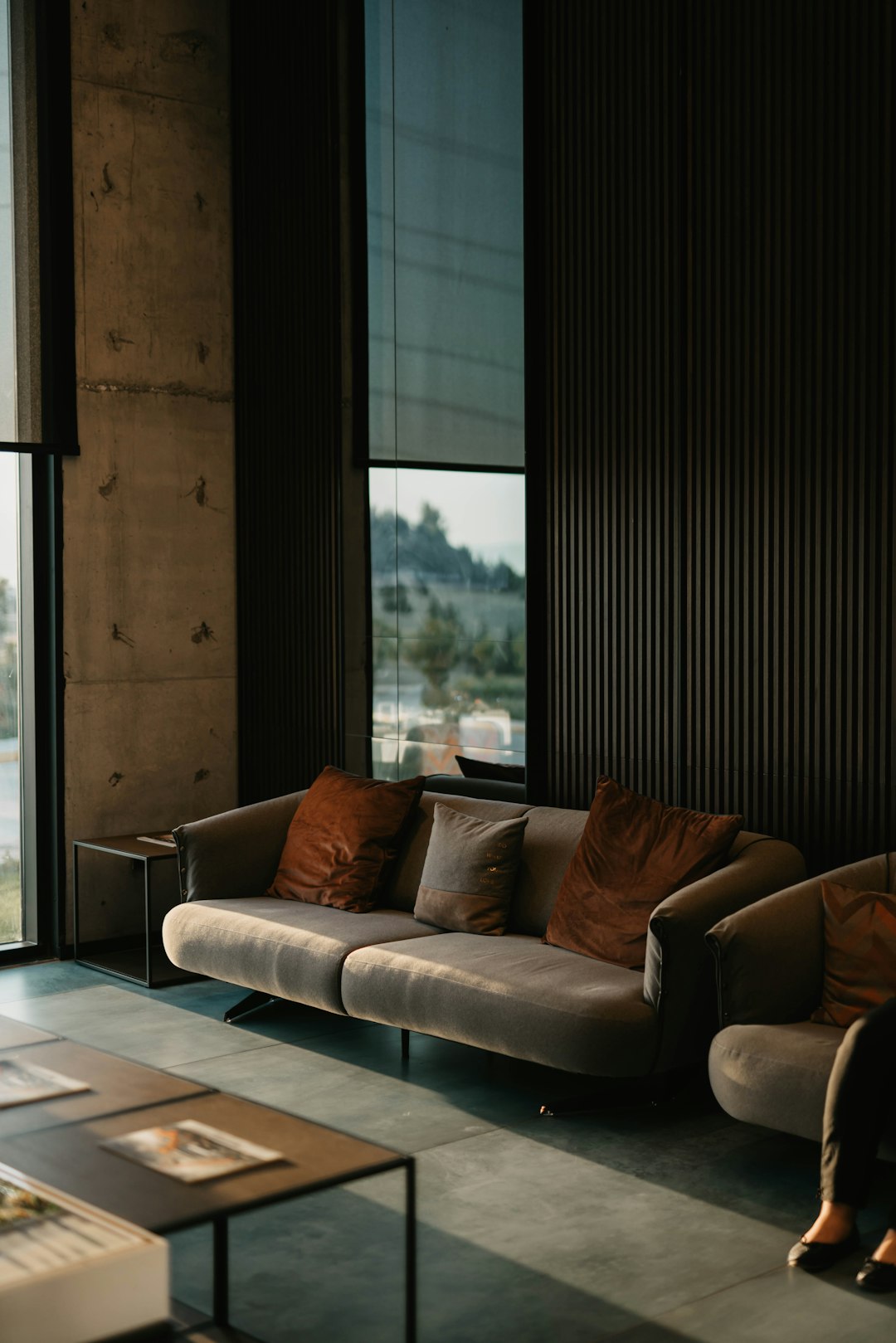 brown-and-white-couch-beside-window-kbytcpi1i5i